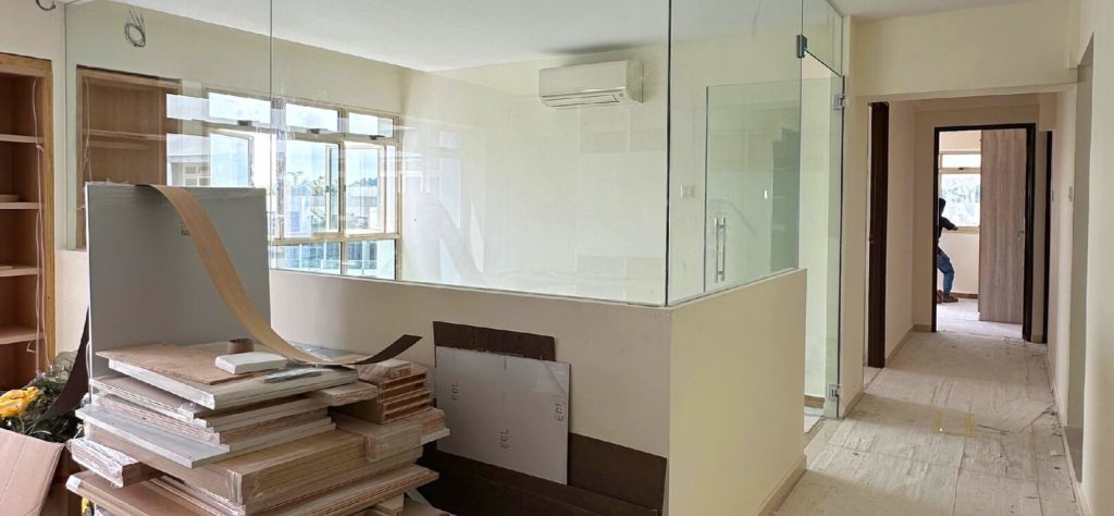 Open living space with large windows, ideal for HDB renovation